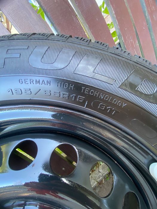 Set 4 cauciucuri iarna Fulda 195/65 R15 cu jante + capace Volkswagen