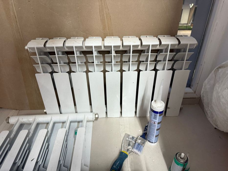 Секционный алюминиевый радиатор отопления. Кол-во секций:9