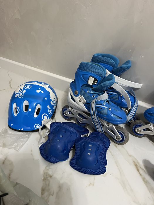 Роликовыйе коньки