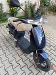 Scuter electric .