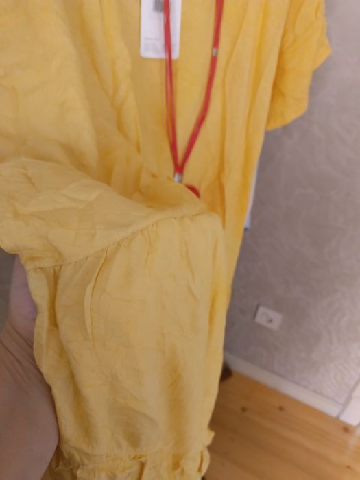 Платья большимерка жёлтого цвета