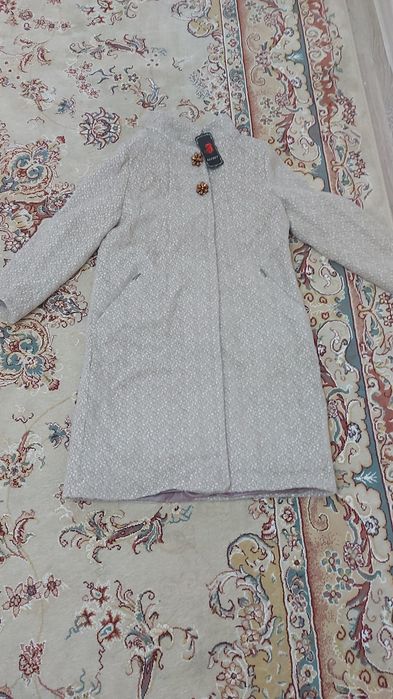 Пальто новое , размер 42-44.