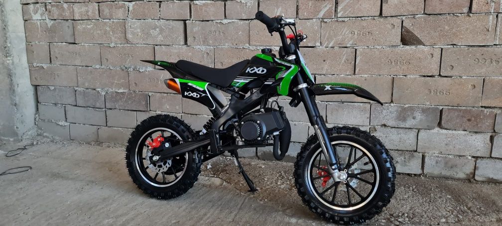 Cross 49cc adus din Germania pentru copii cu motor pe benzina in 2 t