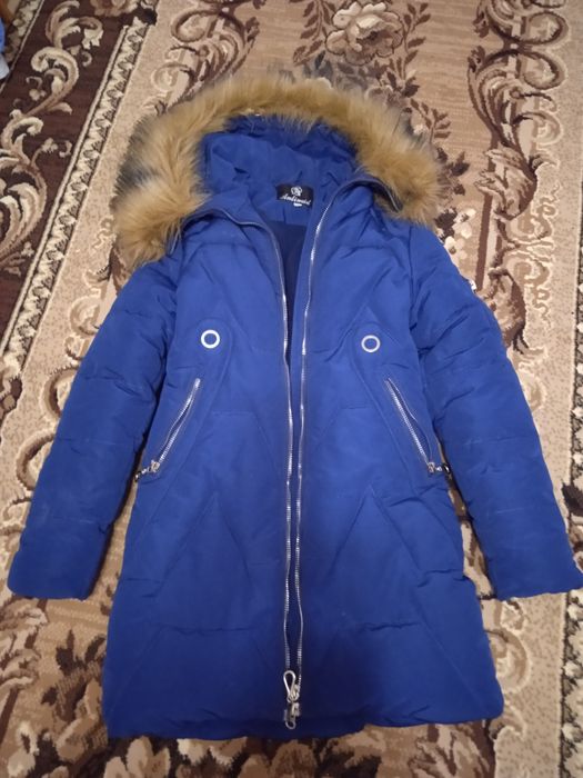 Продам пуховик в отличном состоянии . Рост 164