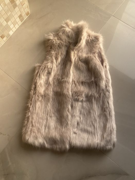 Vesta Berscha,purtata de cateva ori de culoare roz pudra