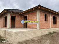 Casa noua pe un nivel la rosu cu 4 camere cu utilitati