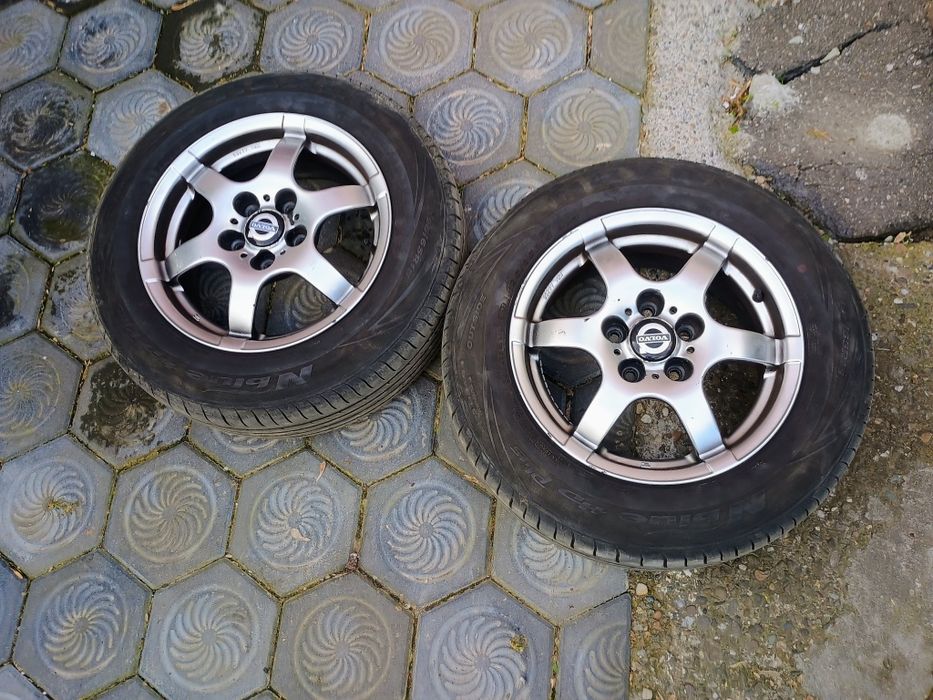 Jante rial +anvelope. 4 buc ..Ford Volvo Mazda