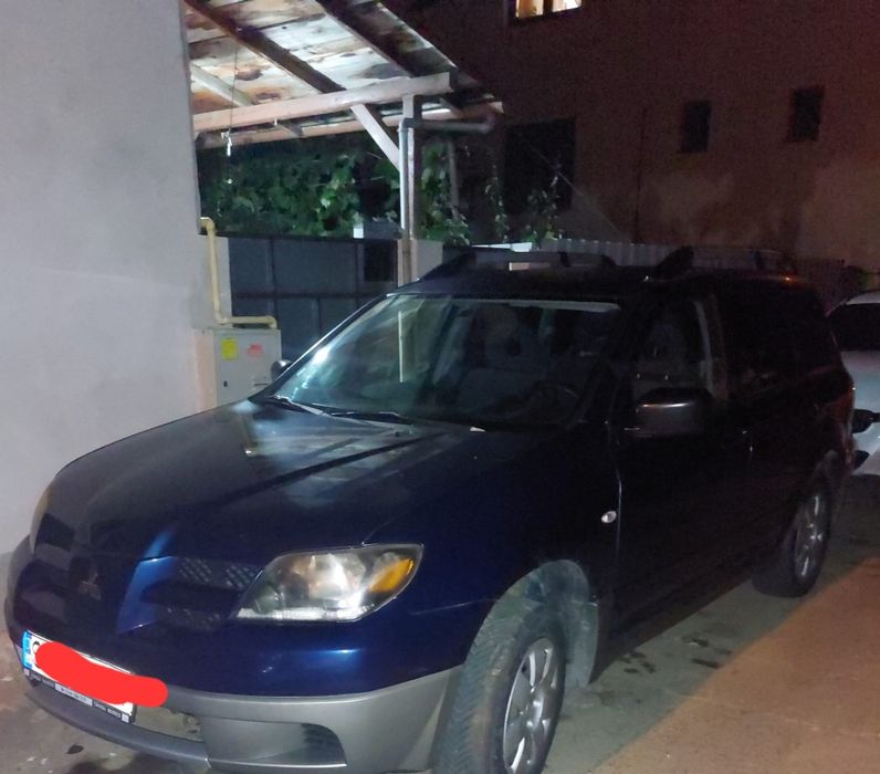 Vând Mitsubishi Outlander 4*4