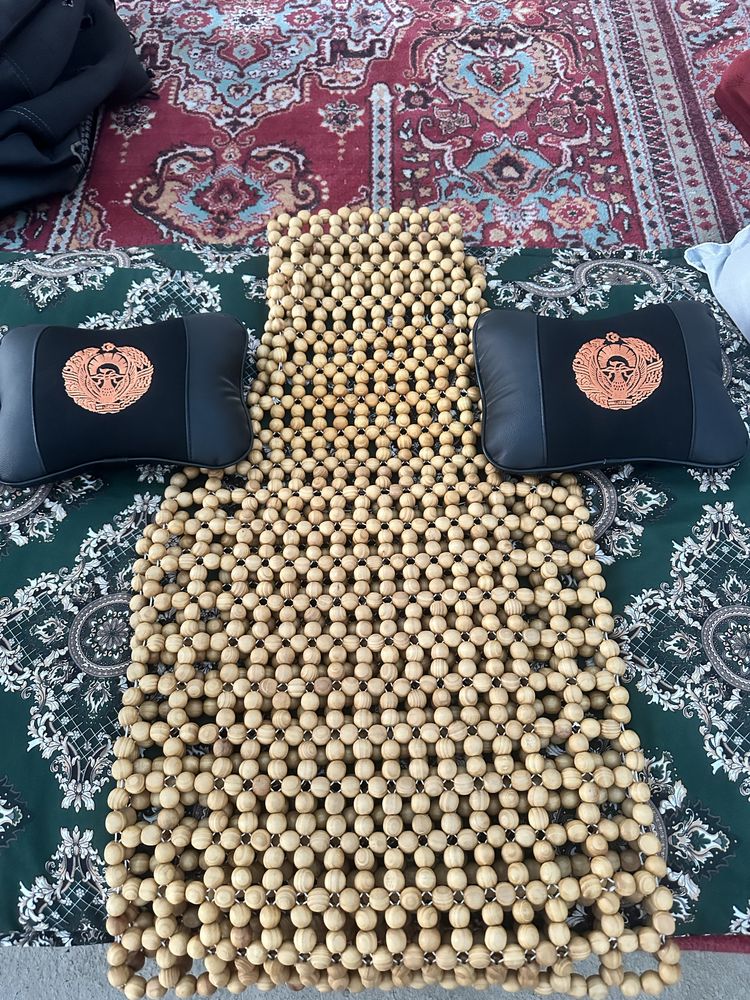 Moshina uchun qullay yostiqchalar va yogochli masajnik