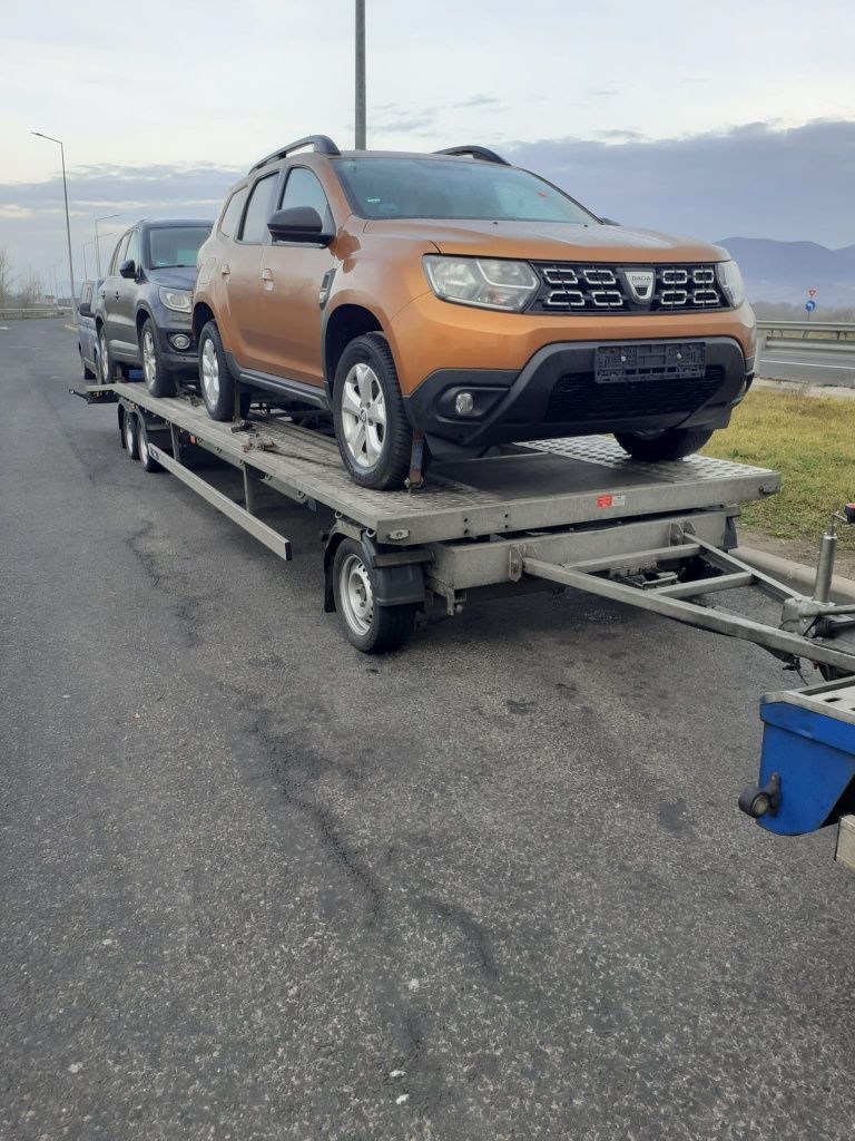 Transport auto pe platformă