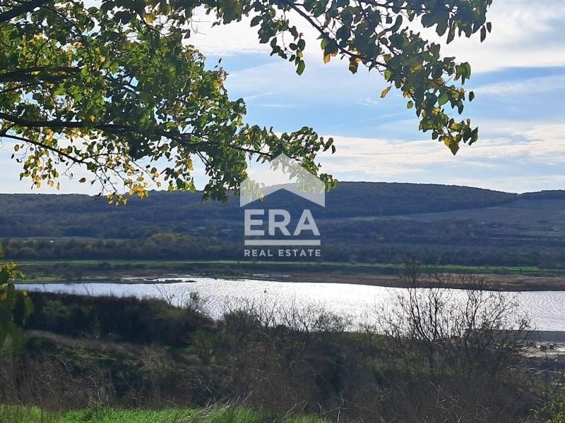 Урегулиран поземлен имот за продажба, с влязъл в сила ПУП и ПРЗ, в сел