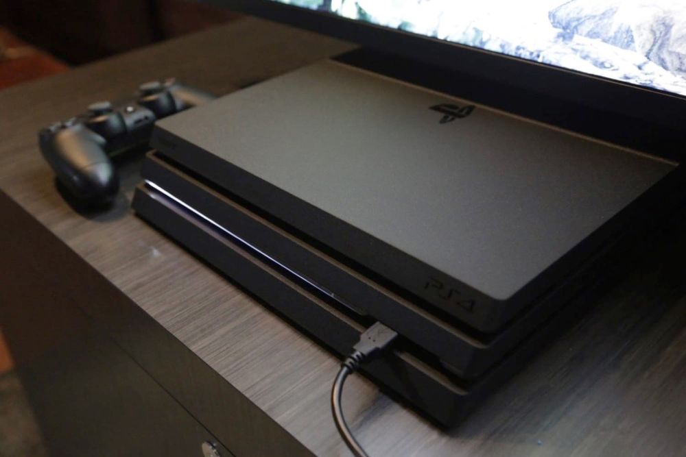 PlayStation 4 Pro 1TB 15 игр послдними  играми в идеале
