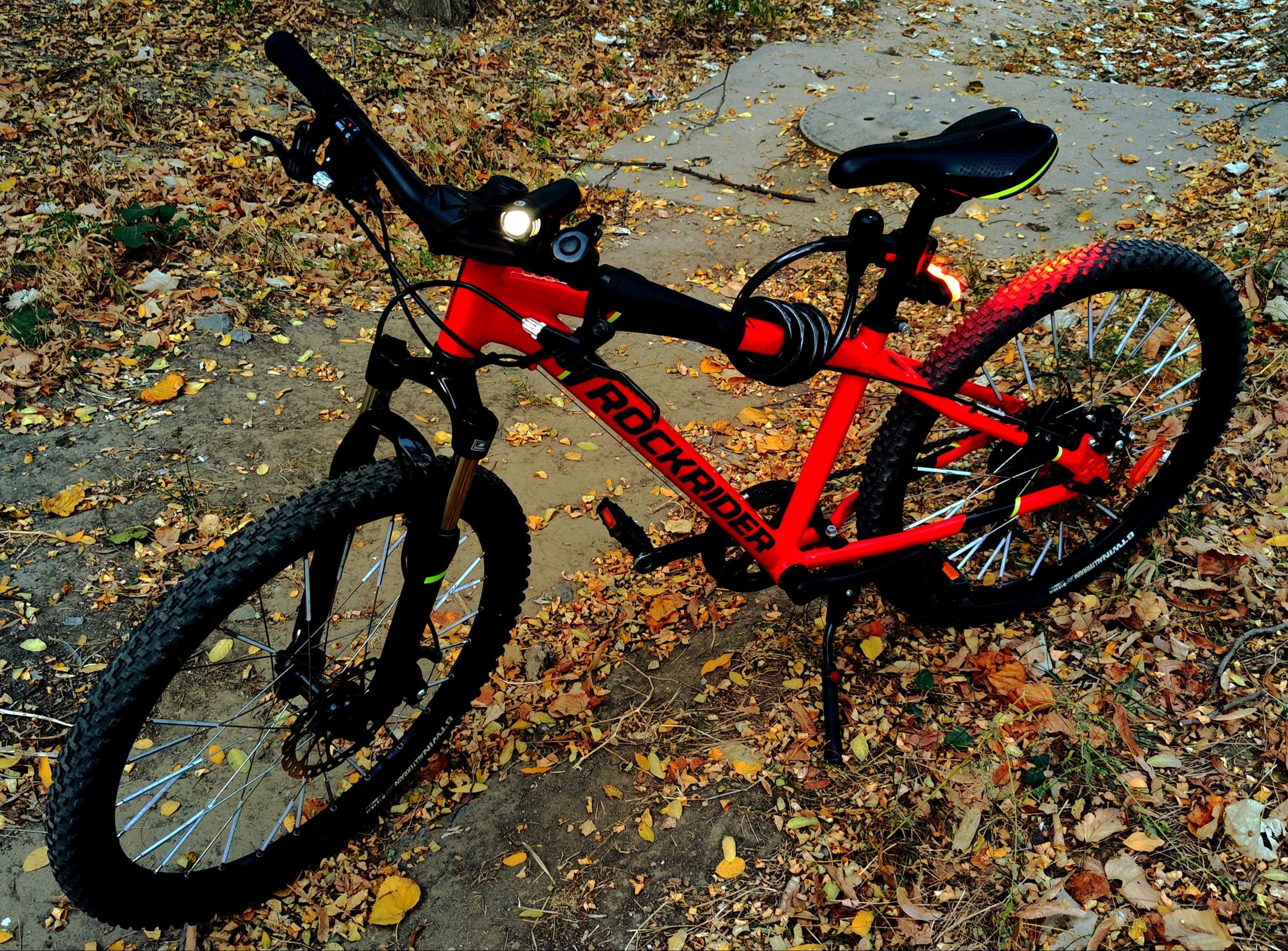 Bicicleta MTB Rockrider ST900 24" rosie pentru copii de 9-12 ani