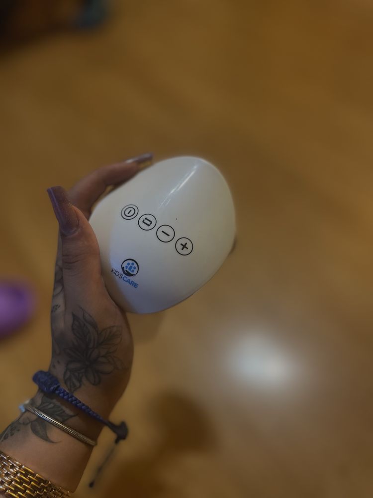 Pompa electrica pentru san portabila cu masaj KIDSCARE
