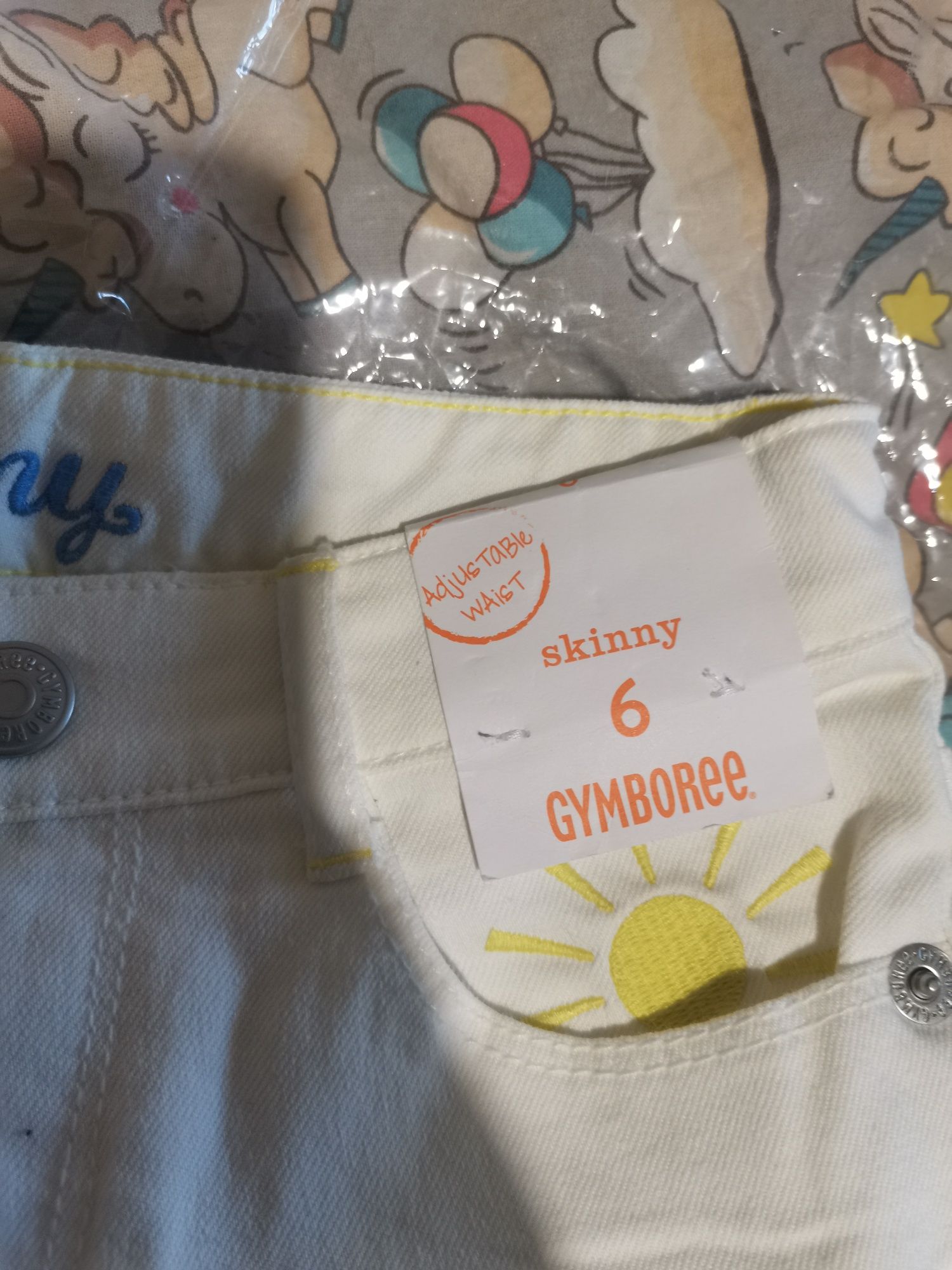 Белые джинсы на девочку Gymboree