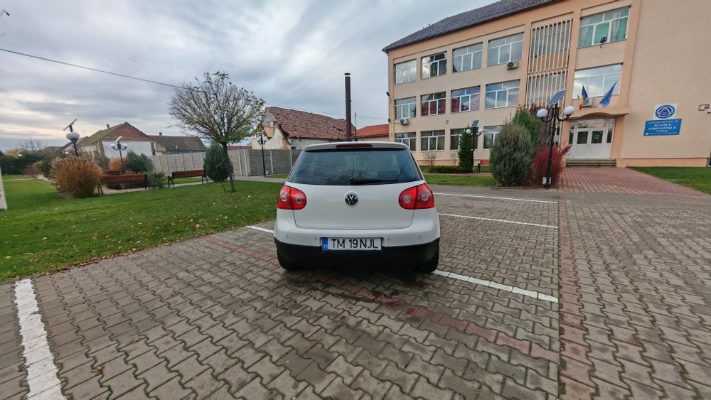 Vw golf 5 an 2009  1.4 benzina