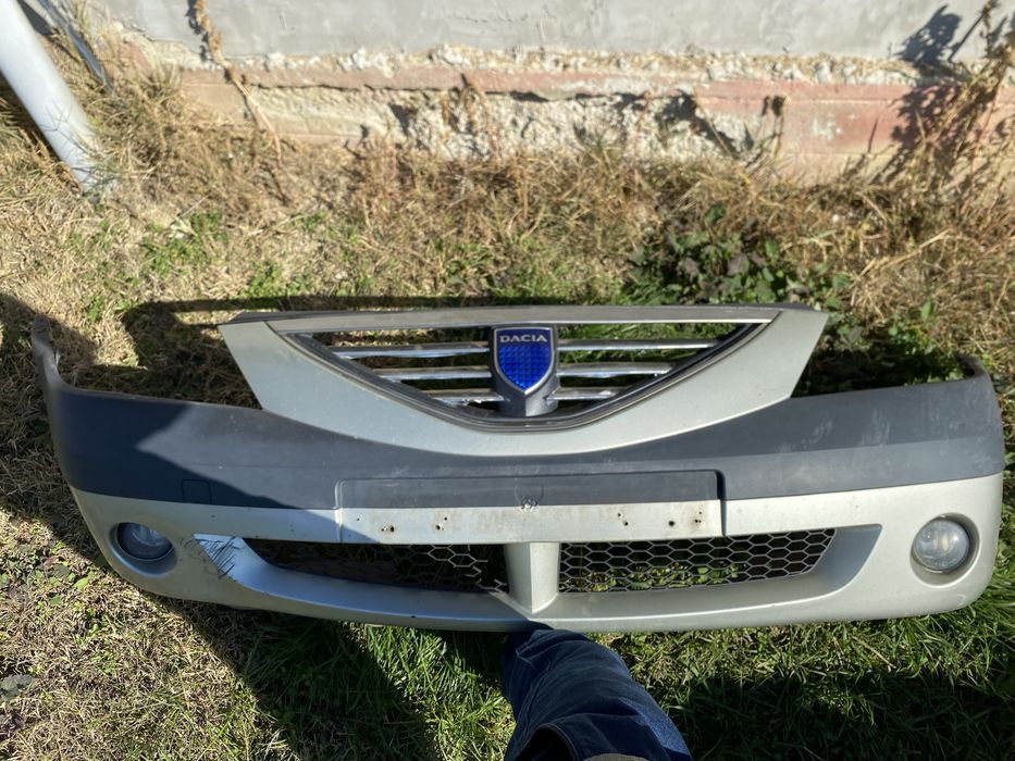 Vând bară față dacia logan facelift si 2 faruri