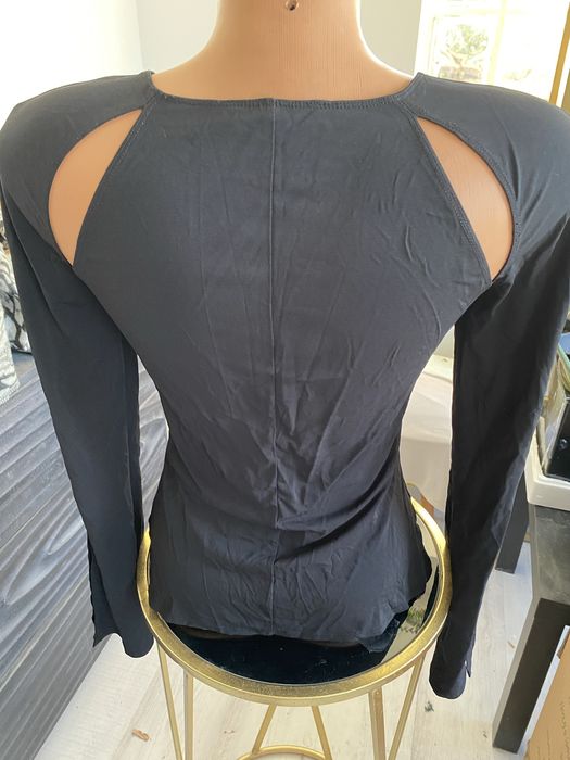 Top  dama  cu decupaje si maneci desfacute