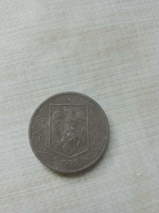 Vând moneda 500 lei din anul 1999 cu 800 lei