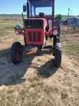 Vand tractor u650 si balotiera New Holland 276