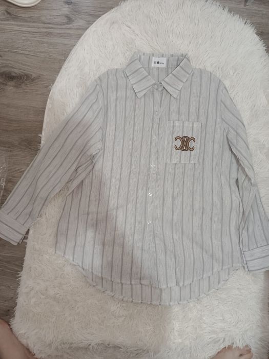 Рубашку новую продам