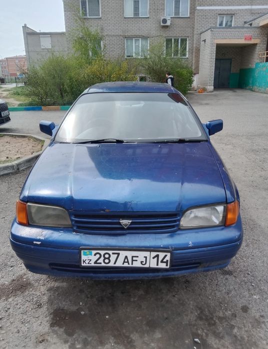 Машина Toyota Corsa