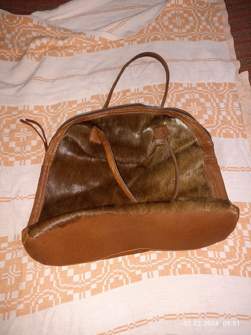 Женская сумка кожаная с волосами животного низнаю какого