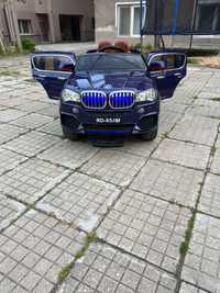 Акумулаторен джип тип BMW , 12V с MP4 видео/дисплей, меки гуми и кожа