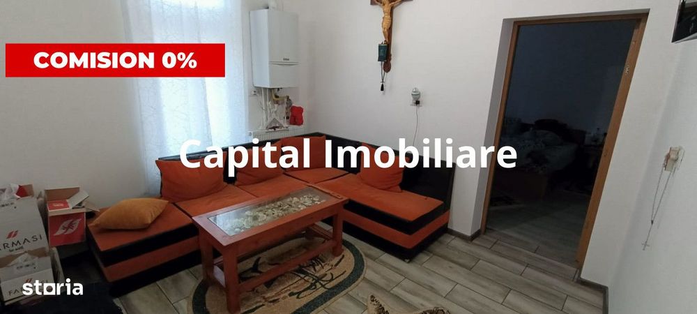 Constructie cu 3 apartamente + teren+ 2 spatii comerciale