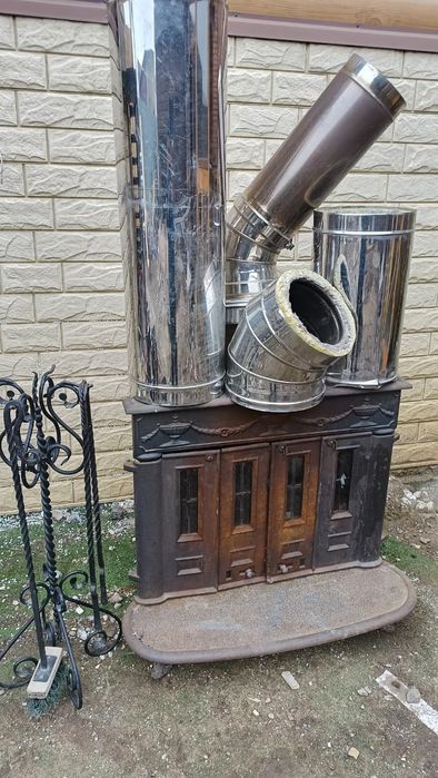 Продам мощный чугунный камин с комплектом дымоходов