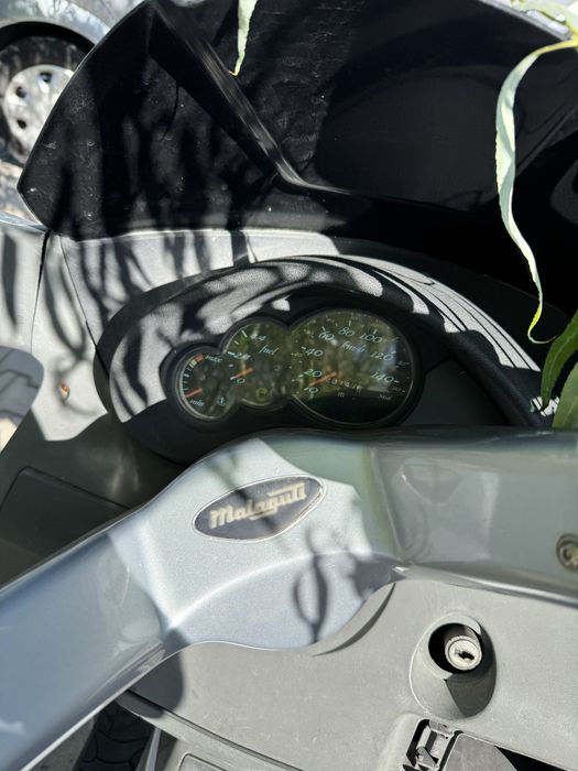 motocicleta  152 cm