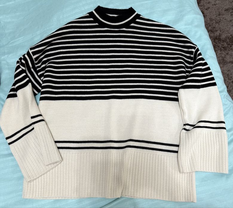 Правя разпродажба на нови и запазени дрехи.