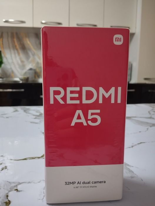 Продаю запечятонный Redmi A5