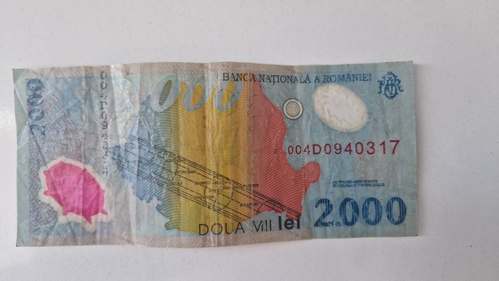 Bani vechi cu eclipsa și moneda de 5000 lei