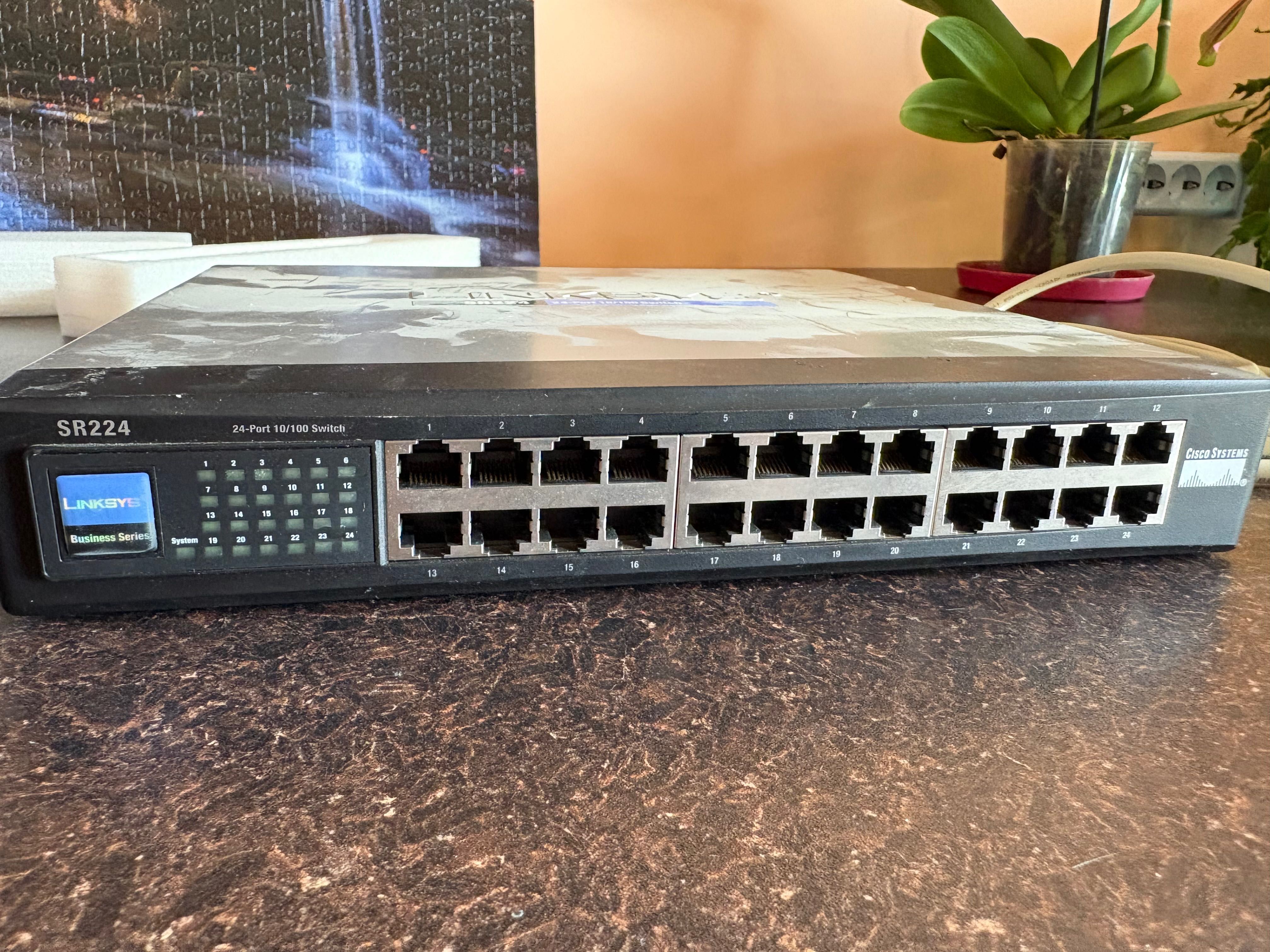 24 портов суич Linksys 10/100