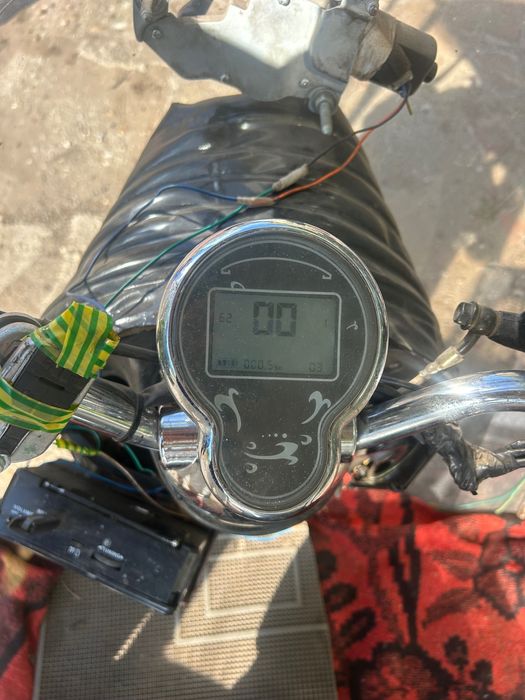 Moto tricicletă cu Cabină