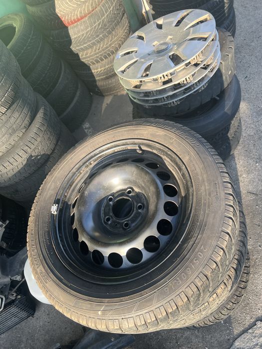 set jante tabla pt audi cu capace originale si cu anvelope 205 60 16