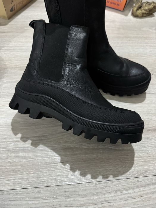 Продам новые сапоги