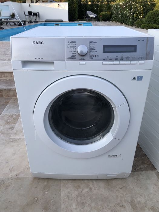 Masina de spalat si uscator de rufe AEG cu pompa de caldura