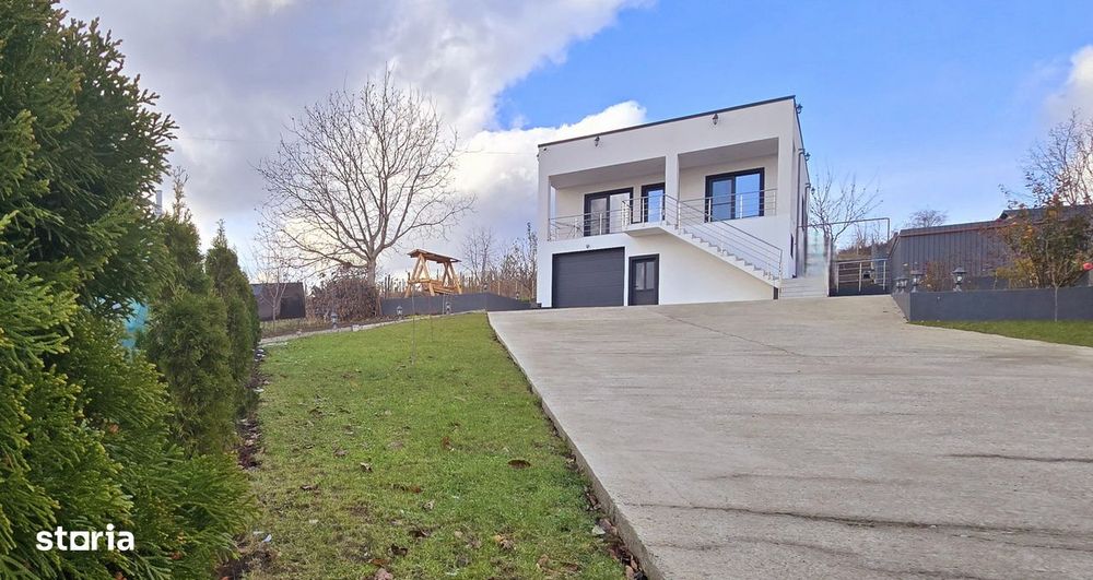 CASA MODERNA 4 camere 2 bai 210 mp Garaj Teren 1050 mp CIURBESTI