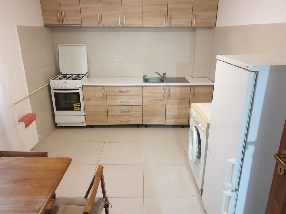 Garsoniera la casa cu curte