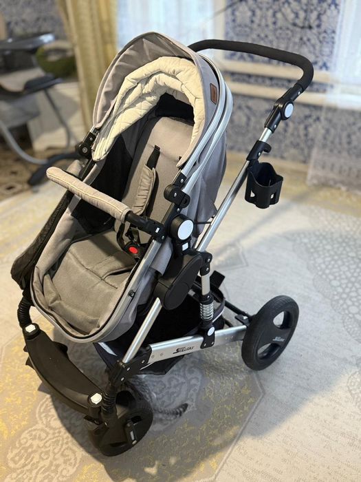 Продам коляску и столик для кормления