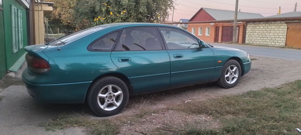 Продам машину мазда 626.цвет зеленыи перламутр.