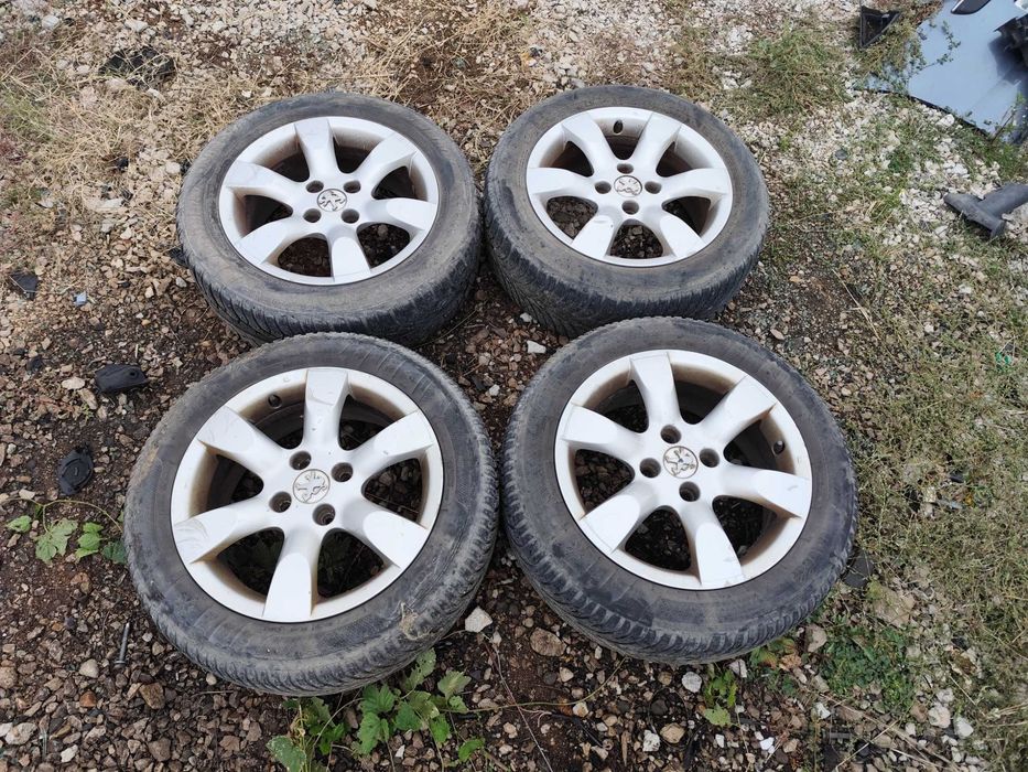 Джанти с гуми 4*108 16"