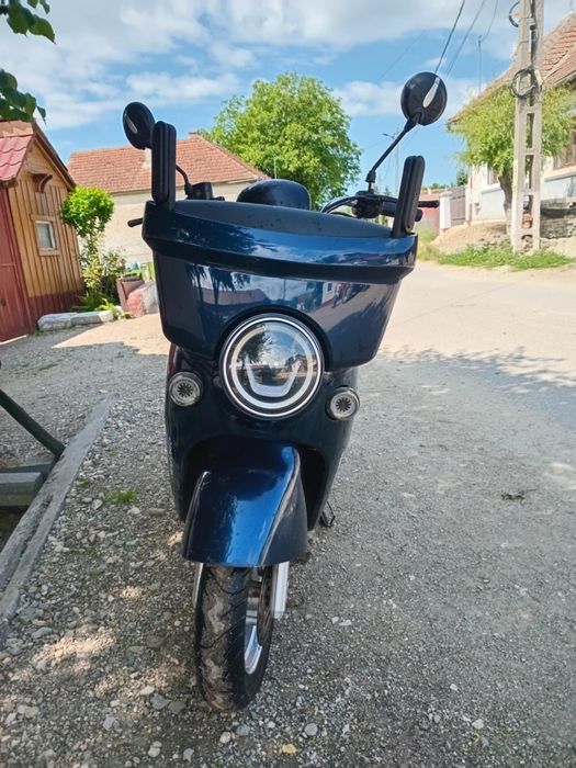 Schimb scuter electric cu mașina