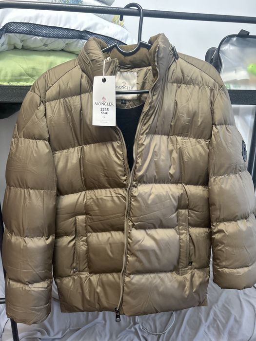 Куртка 18000тг новый ни разу не одетый