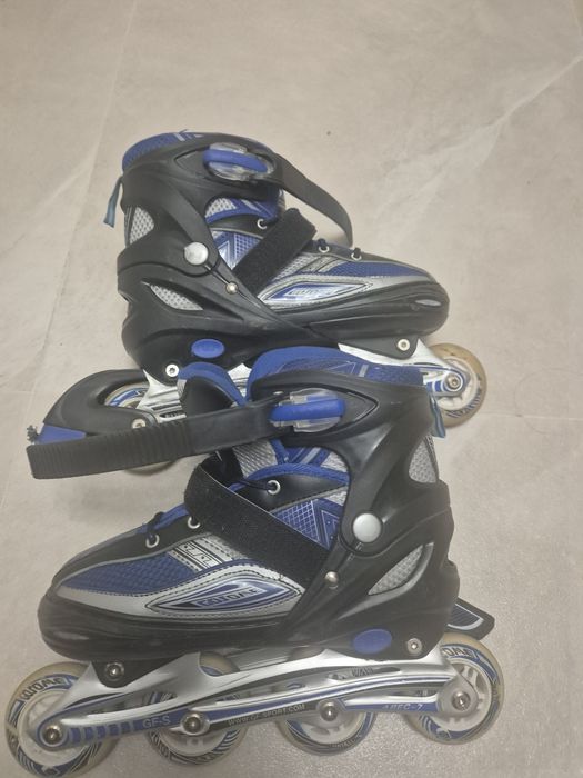 Роликовые коньки