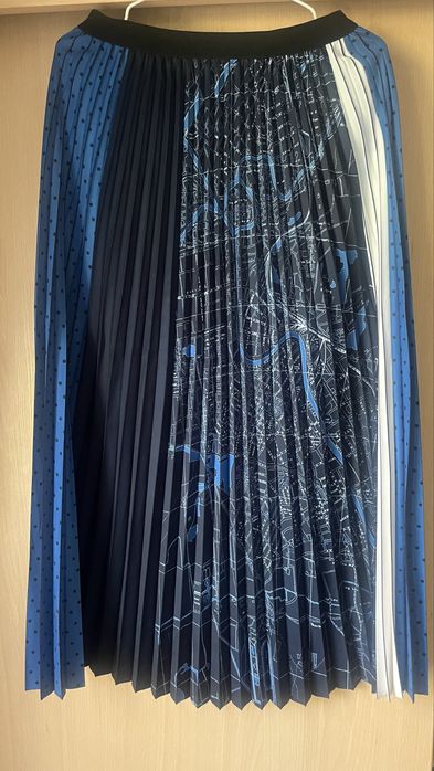 Юбка длини миди