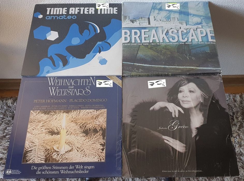 Vând viniluri noi-sigilate