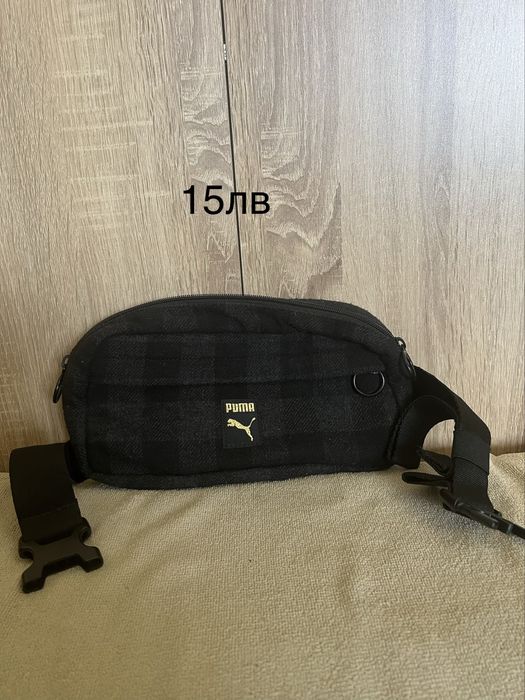 Дамска чанта на puma и две раници .